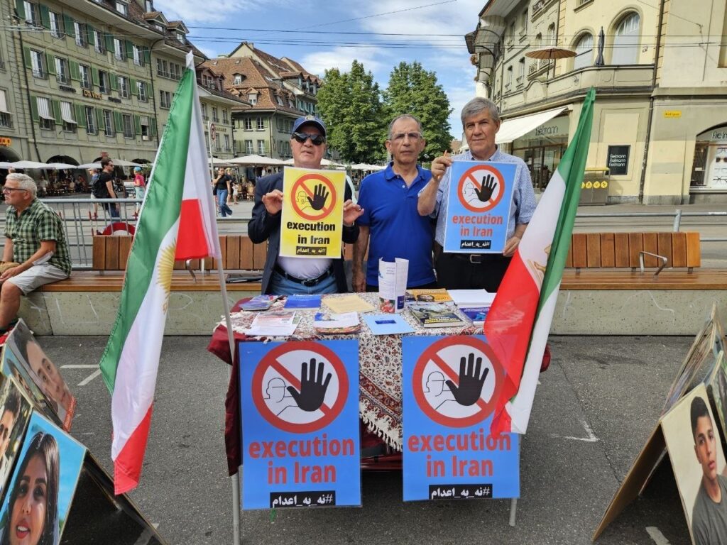 Büchertisch in Bern gegen die Hinrichtungen im Iran