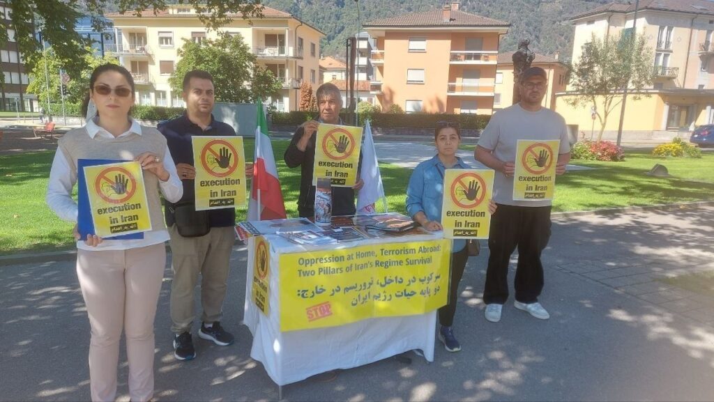 Schweiz – Bellinzona: Büchertisch gegen die Hinrichtungen im Iran